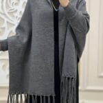 Folded grey fleece shawl showing plain design