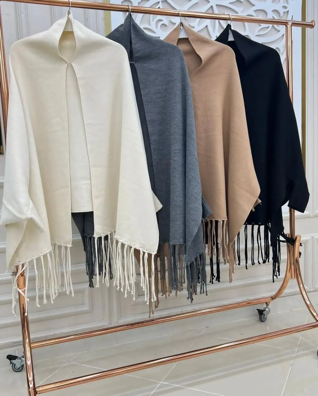 Flat lay of plain fleece shawl in grey color