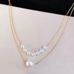 Women’s 2 layered gold plated pearl necklace front view