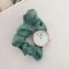 Elegant women’s water resistant round watch – green strap