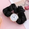 Women’s round analogue quartz watch – black strap