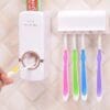 White toothpaste dispenser and brush holder set – 2 pcs