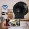 Portable surveillance camera with wide-angle lens closeup