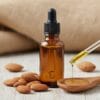 Almond oil bottle with almonds – pure herbal oil Pakistan
